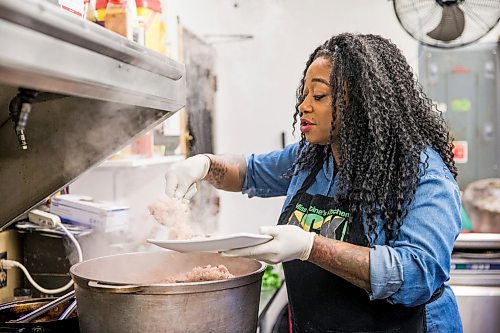 MIKAELA MACKENZIE / WINNIPEG FREE PRESS

Christine Pattison, owner of Christines Kitchen, serves up some rice and peas in her authentic Jamaican restaurant in Winnipeg on Tuesday, Feb. 11, 2020. For Eva Wasney story.
Winnipeg Free Press 2019.