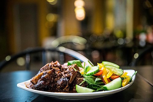 MIKAELA MACKENZIE / WINNIPEG FREE PRESS

Oxtail with rice and peas at Christines Kitchen in Winnipeg on Tuesday, Feb. 11, 2020. For Eva Wasney story.
Winnipeg Free Press 2019.