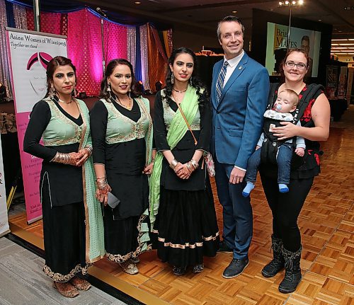 JASON HALSTEAD / WINNIPEG FREE PRESS

L-R: Members of dance group Flit City, Simrat Brar, Mani Mann and Shine Brar, with Andrew Smith (MLA for Southdale), Jaime Smith and Lincoln Smith  at the Lohri Mela celebration at the RBC Convention Centre Winnipeg on Jan. 11, 2020. (See Social Page)