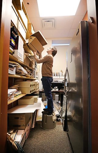 RUTH BONNEVILLE  /  WINNIPEG FREE PRESS 

FAITH - Religious archives story for 49.8

Archivist,  Andrew Morrison, stands on a stool in a room full of newly received documents that still need to be organized and archived.

STORY INFO: At the Jewish Heritage Centre, executive director Belle Jarniewski also struggles to find space for the many items in the collectionmore than 70,000 photos, 1,300 sound and moving image recordings, 1,000 textual records, 200 bound volumes of newspapers, and over 4,000 artefacts."
They have hired a part-time archivist (Andrew Morrison) to handle all the new incoming documents but it's not enough to keep up.


See story by John Longhurst

Feb 5th, 2020
