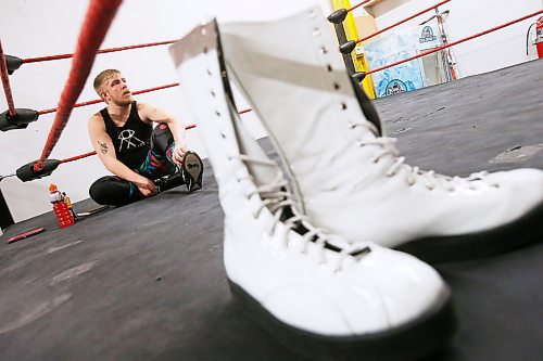 JOHN WOODS / WINNIPEG FREE PRESS
A pair of boots sit ringside as wrestler George Hudson, aka Dash Royal, warms up Wednesday, February 12, 2020. Wrestling involves artistry, performance and storytelling.
Reporter: Koncan