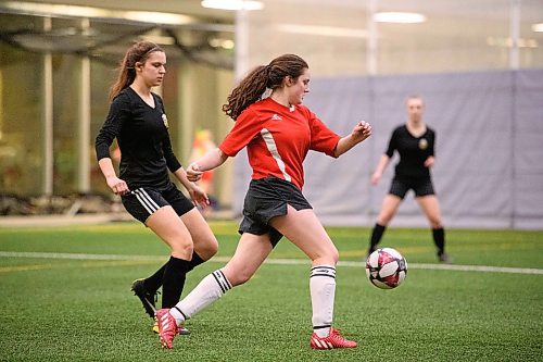 Mike Sudoma / Winnipeg Free Press
Hannah Robichaud, of the NKCC Cobrasworks around Charleswood defence during the Golden Boy Tournament Thursday evening at the Duck Worth Centre 
February 13, 2020