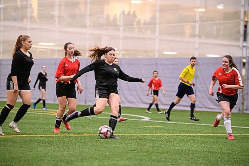 Mike Sudoma / Winnipeg Free Press
Payton Holland, of the Charleswood Youth Soccer Association takes a shot on goal during the Golden Boy Tournament Thursday evening.
February 13, 2020