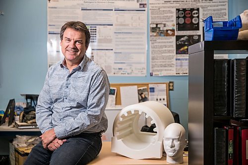 MIKAELA MACKENZIE / WINNIPEG FREE PRESS

James Schellenberg, founder and CEO of Cubresa, poses for a portrait with the BrainPET in Winnipeg on Friday, Feb. 14, 2020. For Martin Cash story.
Winnipeg Free Press 2019.