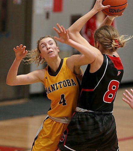 SHANNON VANRAES / WINNIPEG FREE PRESS
A pass by Mikayla Funk of the University of Winnipeg Wesmen is blocked by Keziah Brothers of the University of Manitoba Bisons during a Canada West Play-In Game at the Duckworth Centre on February 14, 2020.