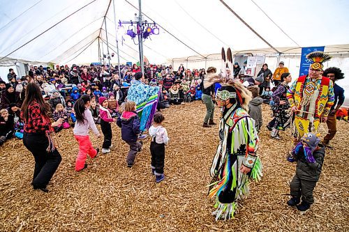 Daniel Crump / Winnipeg Free Press. Traditional indigenous dancers invite the audience up to take part in a round dance during a performance on the first Saturday of Festival du Voyageur. February 15, 2020.