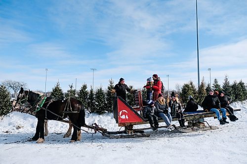 Daniel Crump / Winnipeg Free Press. Visitors to Festival du Voyageur take a sleigh ride around Whittier Park Saturday afternoon. February 15, 2020.