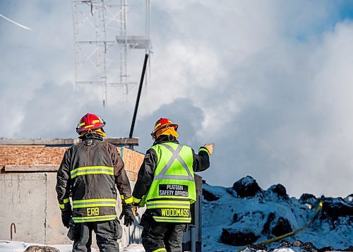 Mike Sudoma / Winnipeg Free Press
Winnipeg Fire Dept crew look over the remains of a condo after a fire broke out at a project off of Phillip Lee Drive early Sunday morning
February 16, 2020