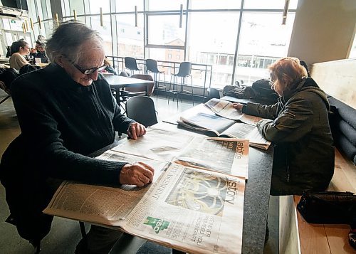 Mike Sudoma / Winnipeg Free Press
Neil (left) and Leona (right) Enns enjoy their copy of Sundays Winnipeg Free Press Sunday afternoon in Hargrave Market
February 16, 2020