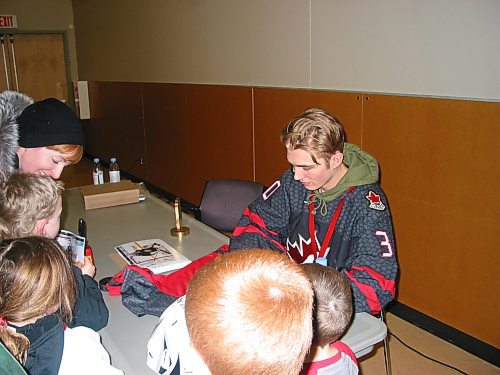 Canstar Community News Feb. 10, 2020 - Goalie for Canada's World Junior team Joel Hofer, who grew up in Headingley, is shown signing autographs for young fans at an event in the Headingley Community Centre on Feb. 10. (ANDREA GEARY/CANSTAR COMMUNITY NEWS)