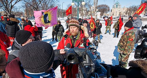 MIKE DEAL / WINNIPEG FREE PRESS
Eric Reder with the Wilderness Committee organized a walk over the lunch hour from the Manitoba Legislative building to the Law Courts building and back in support of the Wetsuweten Hereditary Chiefs who are being forcibly removed from their territory for a fossil fuel project. 
200218 - Tuesday, February 18, 2020.