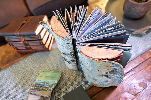 RUTH BONNEVILLE  /  WINNIPEG FREE PRESS 


49.8 NTERSECTION - Book Arts by Debra Frances Plett. 

Intersection piece on Debra's biz, Debra Frances Book Arts. 

Display photo of an incredible log book that is bound with coptic binding.  

For about five years now, Debra has been crafting homemade books, using centuries-old techniques to make covers out of driftwood, ceramics, fur... you name it. 

Photos of Debra in her home studio, working on books in various stages of design - as well as finished products - they're as functional as they are artistic - of all sorts.

See Dave Sanderson's story.  

Feb 18th,, 2020
