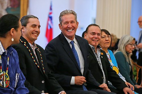 MIKE DEAL / WINNIPEG FREE PRESS
(From left) Elder Francis, AMC Grand Chief Arlen Dumas, Premier Brian Pallister, Manitoba Keewatinowi Okimakanak Grand Chief Garrison Settee, Mathias Colomb Cree Nation Chief Lorna Bighetty, War Lake FN Chief Betsy Kennedy. 
Premier Brian Pallister laughs prior to the start of the signing ceremony of a memorandum of understanding to formalize an agreement on the transfer of the provinces northern airports and marine operations to First Nations ownership and operation, Thursday morning in the Manitoba Legislative building. 
200220 - Thursday, February 20, 2020