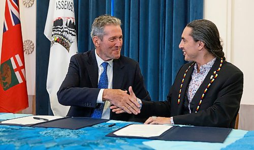 MIKE DEAL / WINNIPEG FREE PRESS
AMC Grand Chief Arlen Dumas and Premier Brian Pallister during the signing ceremony of a memorandum of understanding to formalize discussions toward an agreement on the transfer of the provinces northern airports and marine operations to First Nations ownership and operation, Thursday morning in the Manitoba Legislative building.  
200220 - Thursday, February 20, 2020.