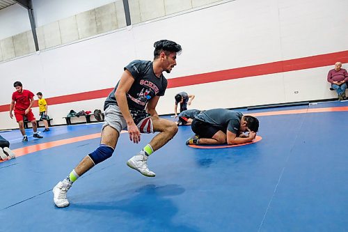 Daniel Crump / Winnipeg Free Press.¤Syrian born freestyle wrestler Khaled Aldrar runs a drill during during team practice. February 20, 2020.