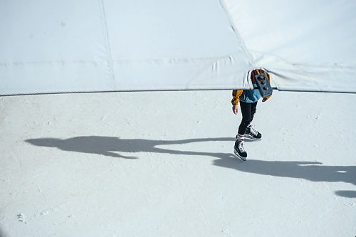 Mike Sudoma / Winnipeg Free Press
An ice skater does a few laps underneath the canopy of the ice skating rink at The Forks Market Friday afternoon
February 16, 2020