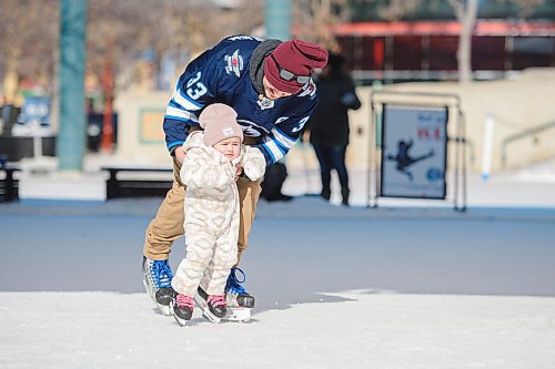 Mike Sudoma / Winnipeg Free Press
Chat Peterson helps his daughter Emilia as she goes for her first skate Friday afternoon
February 16, 2020