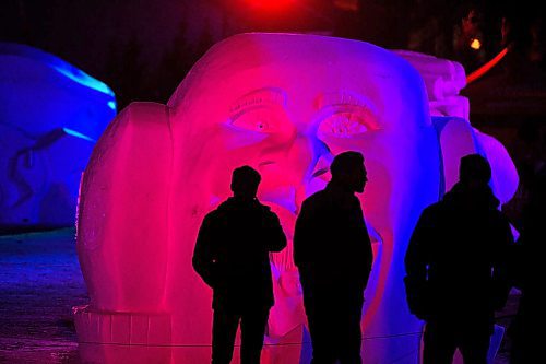 Mike Sudoma / Winnipeg Free Press
Festival Du Voyageur goers take a second to stare at the eyes catching Scream sculpture which is part of this years Festival Du Voyaguer International Snow Sculpture Symposium Friday evening
February 16, 2020