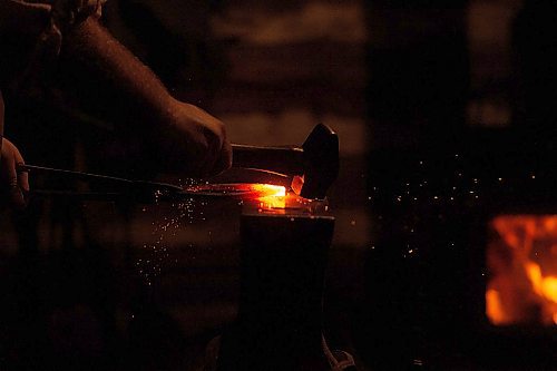 Mike Sudoma / Winnipeg Free Press
Blacksmith, Dylan Preece, works on a project Friday evening inside the Forge at Festival Du Voyaguer Friday evening
February 16, 2020