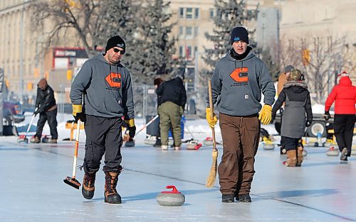 JASON HALSTEAD / WINNIPEG FREE PRESS

From left, I Swept with Your Wife team members Jack Lavallée and Glen Henderson follow a stone in the championship match against the team  Hack Job at the 19th annual Ironman Outdoor Curling Bonspiel on Feb. 9, 2020 in Memorial Park. (See Social Page)