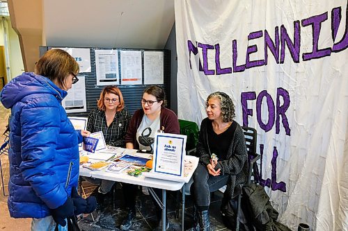 Daniel Crump / Winnipeg Free Press.¤Della Loughhead (left), who says she goes to the library almost everyday, speaks to members of the Millennium For All group tabling in front of the Millennium Library on Saturday. February 22, 2020.