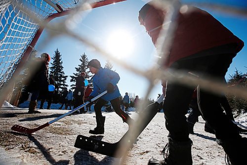 JOHN WOODS / WINNIPEG FREE PRESS
Children play street hockey on the last day of Festival du Voyageur in Winnipeg Sunday, February 23, 2020. 

Reporter: Standup