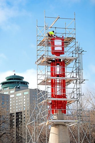 RUTH BONNEVILLE  /  WINNIPEG FREE PRESS 

Local -  Standup photo, Forks Dolphin

An electrician with Global Electric stands on the scaffolding as he fixes the lights in the Dolphin, the large lighthouse type structure on the Assiniboine River, at the Forks Monday.

Work began on the structure in the fall but  had to be stopped due to high water levels and uneven ice surface in the early winter that made it dangerous to work on. The scaffolding will be removed in the coming days now that the work is close to completion. 

Feb 24th,, 2020
