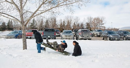 MIKE DEAL / WINNIPEG FREE PRESS
Red River Colleges Indigenous Winter Games kicked off Monday morning at the Notre Dame Campus where students (from left), Joseph Lagrelle, Henry Chezick, and Gabriel Nanacowop competed the moose hauling competition.
200224 - Monday, February 24, 2020.