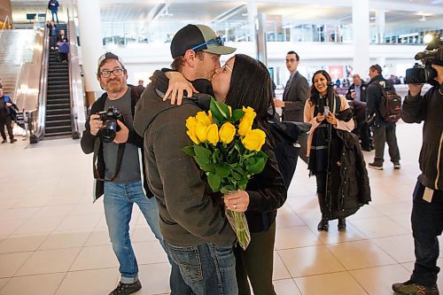 MIKE DEAL / WINNIPEG FREE PRESS
Team Manitoba skip Kerri Einarson kisses her husband, Kyle, after arriving at the Winnipeg James Armstrong International Airport Monday morning following her teams big win at the Scotties Tournament of Hearts in Moose Jaw, Sask. on Sunday.
200224 - Monday, February 24, 2020.