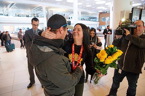 MIKE DEAL / WINNIPEG FREE PRESS
Team Manitoba skip Kerri Einarson kisses her husband, Kyle, after arriving at the Winnipeg James Armstrong International Airport Monday morning following her teams big win at the Scotties Tournament of Hearts in Moose Jaw, Sask. on Sunday.
200224 - Monday, February 24, 2020.