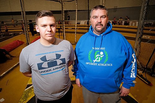 Daniel Crump / Winnipeg Free Press. Dylan Barnych (left) with his dad and coach Dale Barnych (right) during a training session at Max Bell Centre. February 24, 2020.