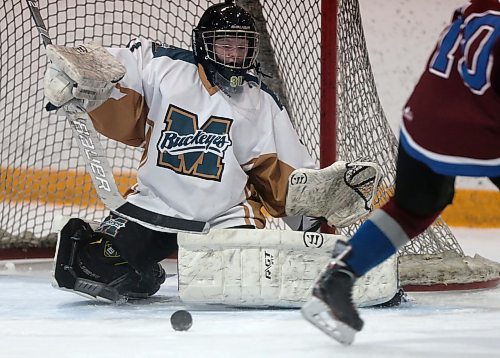 SHANNON VANRAES / WINNIPEG FREE PRESS
Goalie Camryn Butler of the Miles Mac Buckeyes blocks a shot by Noelle Bate of the Sturgeon Heights Huskies during a game at the St. James Civic Centre on February 25, 2020.