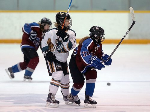 SHANNON VANRAES / WINNIPEG FREE PRESS
Leiva Mann of the Miles Mac Buckeyes is blocked by Hailey Ross of the Sturgeon Heights Huskies during a game at the St. James Civic Centre on February 25, 2020.