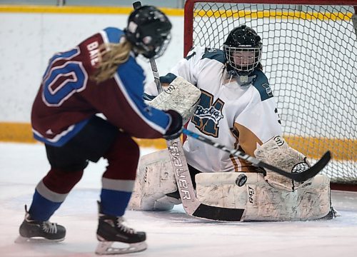 SHANNON VANRAES / WINNIPEG FREE PRESS
Goalie Camryn Butler of the Miles Mac Buckeyes blocks a shot by Noelle Bate of the Sturgeon Heights Huskies during a game at the St. James Civic Centre on February 25, 2020.