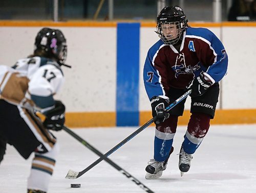 SHANNON VANRAES / WINNIPEG FREE PRESS
Hannah Hutchison of the Miles Mac Buckeyes skates towards Emma Pool of the Sturgeon Heights Huskies during a game at the St. James Civic Centre on February 25, 2020.