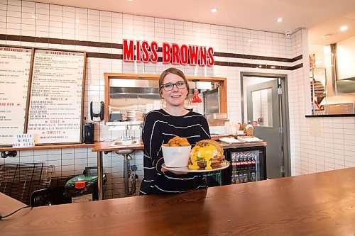 Mike Sudoma / Winnipeg Free Press
Miss Browns co-founder, Jenny Tyrell serves up a freshly made dish of Eggs Benedict and Hashbrowns at their new location inside of Hargrave Market Thursday afternoon
February 27, 2020