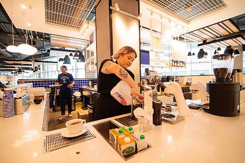 Mike Sudoma / Winnipeg Free Press
Steph Derksen makes a Hot Chocolate for a customer at Fools and Horses new location inside of Hargrave Market Thursday afternoon
February 27, 2020