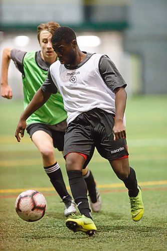 MIKE DEAL / WINNIPEG FREE PRESS
Tofa Fakunle in white with the ball during scrimmage at the Valour FC open trials finished up Thursday afternoon at the UofM Soccer Complex.
200227 - Thursday, February 27, 2020.