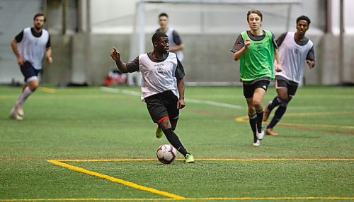 MIKE DEAL / WINNIPEG FREE PRESS
Tofa Fakunle in white with the ball during scrimmage at the Valour FC open trials finished up Thursday afternoon at the UofM Soccer Complex.
200227 - Thursday, February 27, 2020.