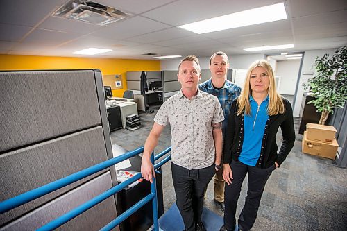 MIKAELA MACKENZIE / WINNIPEG FREE PRESS

Justin Fiebelkorn, technology crimes detective (left), Chad Black, detective, and Sgt. Lisa Bryce of the Winnipeg Police Service's Internet Child Exploitation unit pose for a portrait in their office in Winnipeg on Friday, Feb. 28, 2020. For Dean Pritchard story.
Winnipeg Free Press 2019.