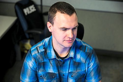 MIKAELA MACKENZIE / WINNIPEG FREE PRESS

Chad Black, detective with the Winnipeg Police Service's Internet Child Exploitation unit, poses for a portrait in their office in Winnipeg on Friday, Feb. 28, 2020. For Dean Pritchard story.
Winnipeg Free Press 2019.