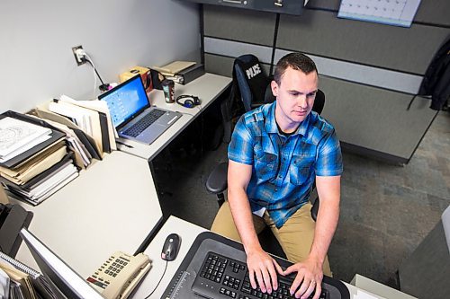 MIKAELA MACKENZIE / WINNIPEG FREE PRESS

Chad Black, detective with the Winnipeg Police Service's Internet Child Exploitation unit, poses for a portrait in their office in Winnipeg on Friday, Feb. 28, 2020. For Dean Pritchard story.
Winnipeg Free Press 2019.