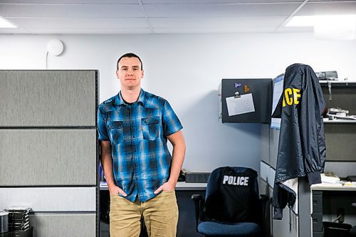 MIKAELA MACKENZIE / WINNIPEG FREE PRESS

Chad Black, detective with the Winnipeg Police Service's Internet Child Exploitation unit, poses for a portrait in their office in Winnipeg on Friday, Feb. 28, 2020. For Dean Pritchard story.
Winnipeg Free Press 2019.