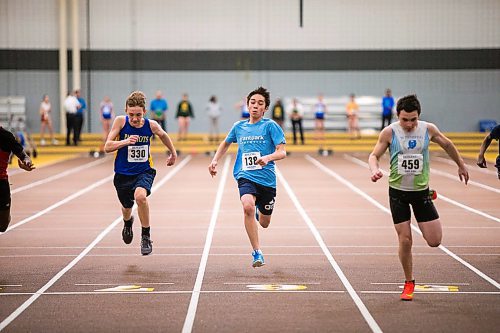 MIKAELA MACKENZIE / WINNIPEG FREE PRESS

Keegan Thorn, 12 (left), William Kenny, 12, and Terick Burchill, 12, cross the finish line at the men's 60m U14 final race at the 39th Annual Boeing Classic Indoor Track & Field Championships at the Max Bell Centre in Winnipeg on Friday, Feb. 28, 2020. Standup.
Winnipeg Free Press 2019.