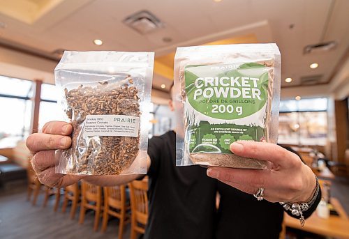 Mike Sudoma / Winnipeg Free Press
(Left to Right) Owners of Prairie Cricket Farms, Ryan and Lesley Steppler, hold up packages of Smokey Bbq crickets and Cricket Powder Wednesday afternoon
February 26, 2020