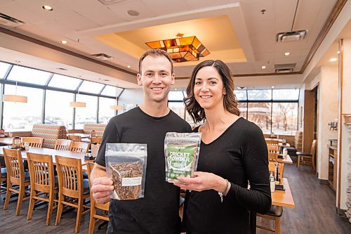 Mike Sudoma / Winnipeg Free Press
(Left to Right) Owners of Prairie Cricket Farms, Ryan and Lesley Steppler, hold up packages of Smokey Bbq crickets and Cricket Powder Wednesday afternoon
February 26, 2020