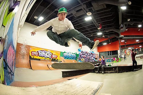 Mike Sudoma / Winnipeg Free Press
Cody Kennerd Kickflips over a picnic table at the Edge Indoor Skatepark Friday evening
February 28, 2020