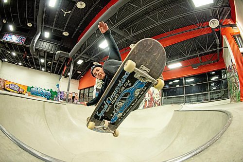 Mike Sudoma / Winnipeg Free Press
Cameron Spence gets a Fakie Ollie in the bowl at the Edge Indoor Skatepark Friday Evening
February 28, 2020