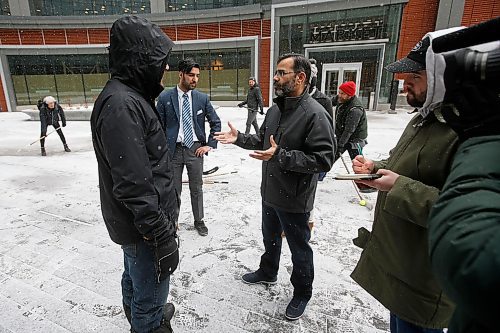 JOHN WOODS / WINNIPEG FREE PRESS
True North Square security manager asks members of Millennium For All to stop playing street hockey and leave True North Square in Winnipeg Sunday, March 1, 2020. The group organized the game to protest lack of access to public space and city budget cuts.
Reporter: Waldman