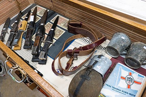 Daniel Crump / Winnipeg Free Press.¤A collection of knifes, reichsmarks, a canteen and other Nazi memorabilia up for auction at McSherrys Auction House in Stonewall on Saturday. February 29, 2020.